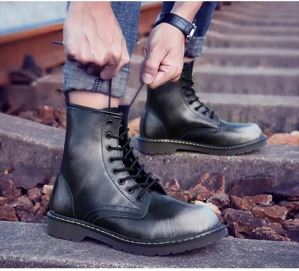 Waterproof leather boots with a classic black finish.
