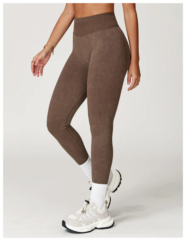 Teal seamless yoga leggings with flattering ribbed design.