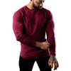 Men's long sleeve cotton tee in black, featuring moisture-wicking technology for comfort and breathability in casual wear.