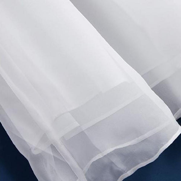 High-waisted pleated trousers in classic navy, perfect for versatile summer styling.