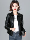 Chic women's sheepskin leather jacket with zippered front, turn-down collar, and pockets for stylish autumn layering.