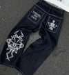 Comfortable mid-waist jeans with vibrant embroidery for street style.