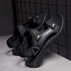 Black arch support sandals with yoga mat insole and adjustable straps on white background