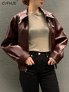 Chic cropped leather jacket for women in premium faux leather, perfect for autumn and winter streetwear fashion.