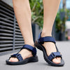 Side profile of cushioned sandals showing elevated arch support feature