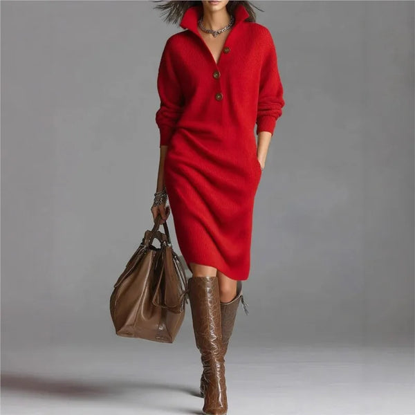 Model wearing the Fireside Chic dress by a crackling fire, showcasing its elegant style.