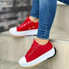 Casual white platform shoes with color-blocked design and medium height lift