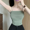 White stretchy camisole top with adjustable suspender straps