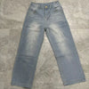 Chic wide leg denim jeans for women in vintage style, featuring mid-rise fit, zipper closure, and functional pockets.
