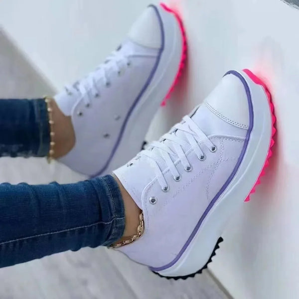 Beige canvas low-top sneakers styled with spring outfit