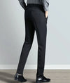 Elegant slim fit men's suit trousers in black, perfect for business attire and formal events, crafted from cotton-polyester b