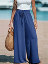 Lightweight polyester summer pants with flowing wide leg silhouette