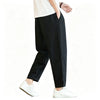 Full body shot of men's joggers showing versatile styling with casual footwear