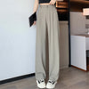 Sophisticated high-waist trousers with straight wide leg silhouette for versatile styling