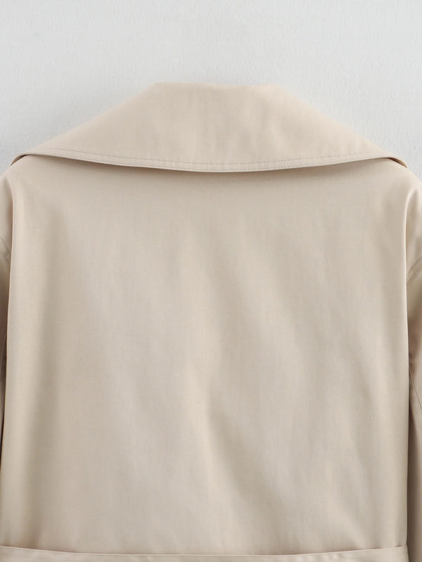 Timeless trench coat with adjustable belt and button closure