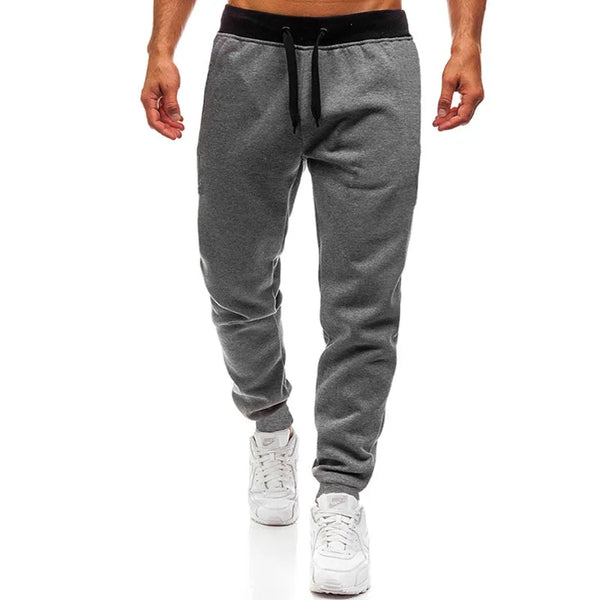 Breathable straight-leg pants featuring modern athletic paneling and relaxed fit