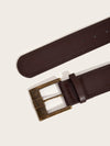 Vintage wide belt for women in black faux leather with metal buckle, perfect for casual or formal wear. Stylish accessory.