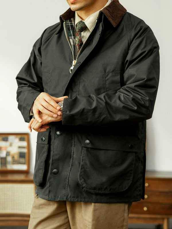 Close-up of the waxed cotton canvas material of the hunting jacket.