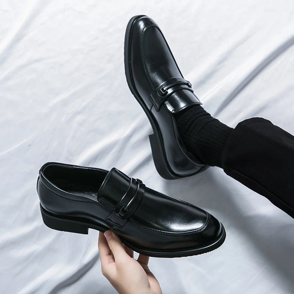 Stylish black loafers ideal for business casual and formal occasions.