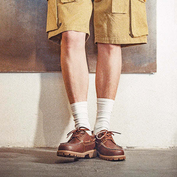 Men's red brown derby dress shoes showing rich leather finish