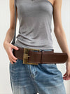 Vintage wide belt for women in faux leather with metal buckle, perfect for casual or formal wear in black, brown, or red.