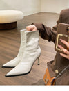 Chic women's ankle boots with zipper, high heel, pointed toe, and PU leather for stylish autumn and winter footwear.