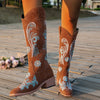 Embroidered mid-calf women's fashion boots with low wedge heel, slip-on design, and durable rubber outsole for comfort and st