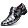 Men's elegant dress shoes with floral design for special occasions.