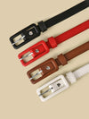 Chic skinny faux leather belt for women in vibrant red, perfect for casual or dressy outfits, featuring a vintage-inspired bu