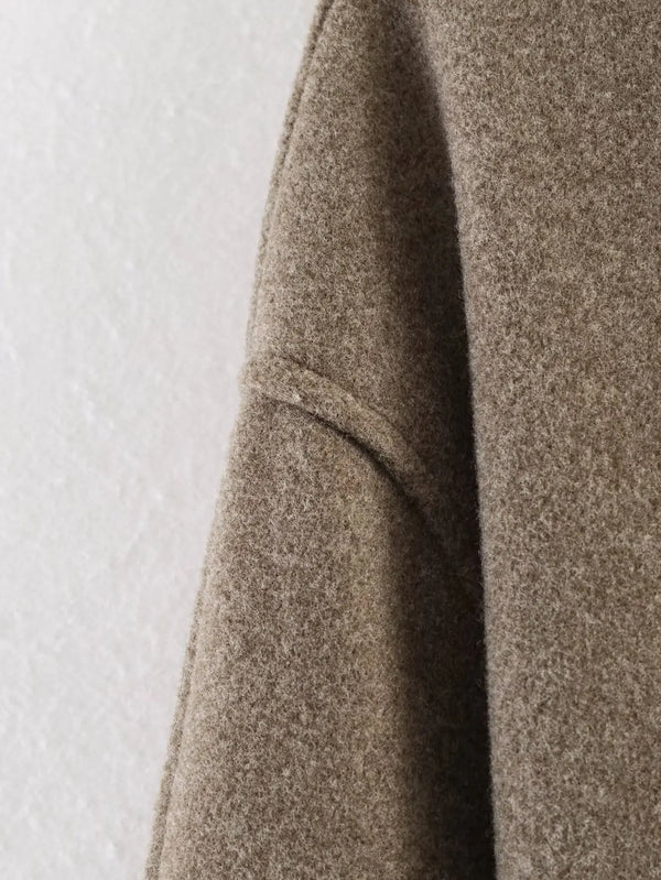 Turtleneck autumn jacket with sash belt detail and comfortable loose-fit cut