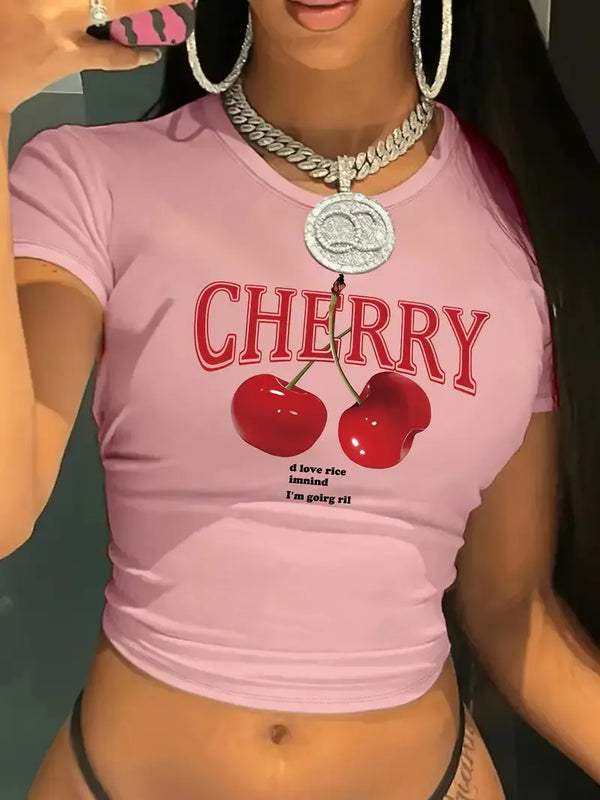 Cherry print Y2K crop top with short sleeves in vibrant red pattern on soft modal fabric