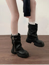 Chic women's mid-calf biker boots with buckle detail, cozy plush lining, and durable rubber sole for stylish winter wear.
