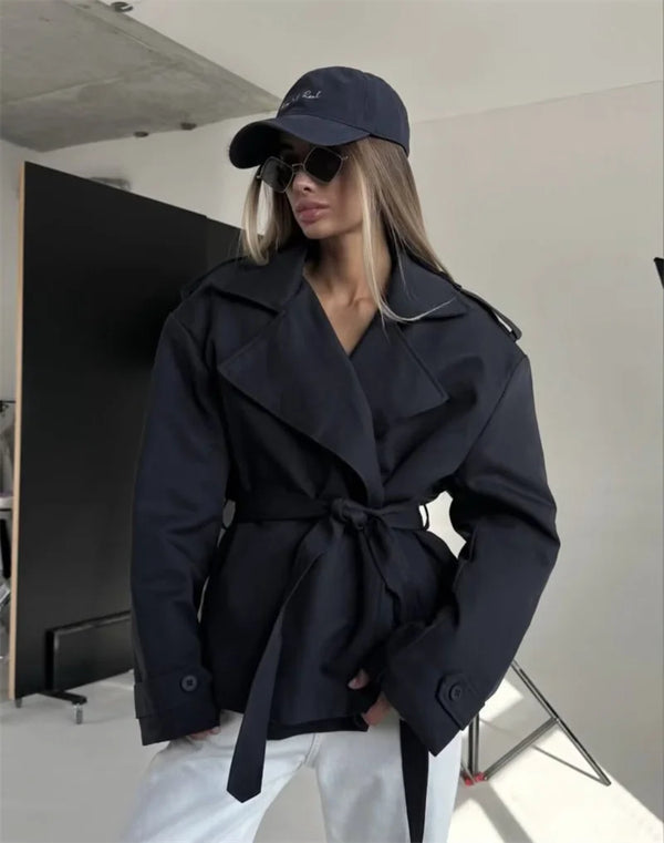 Short trench coat with waist belt and timeless collar design