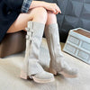 Women's knee-high zippered riding boots in classic style, featuring flannel lining and stacked heel for comfort and elegance.