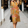 Flowing floral shirt dress with elegant lapel and full-length button closure