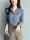 Chic striped blouse for office elegance, featuring a turn-down collar and single-breasted button front, perfect for professio