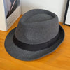 Charming black hat, perfect for winter strolls.