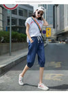 Calf-length harem style jeans with stretchy waistband and comfortable cotton blend