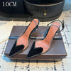 Transparent formal pumps with pointed toe and patent leather trim