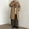 Chic Japanese vintage trench coat for men in black, featuring a single-breasted closure and stylish turn-down collar.