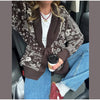 Classic heritage cardigan featuring Fair Isle print and tie waist detail