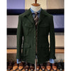 Vintage tweed herringbone men's blazer with four pockets, notched collar, and single-breasted design for stylish occasions.