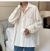 Men's Hollow Out Mesh Long-Sleeve Shirt in black and apricot, featuring breathable fabric and tailored fit for stylish comfor