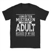 Men's "Mistaken For An Adult" humorous cotton tee with playful print, perfect for casual wear and everyday comfort.