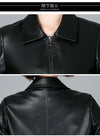 Chic women's sheepskin leather jacket with zippered front, turn-down collar, and pockets for stylish autumn layering.