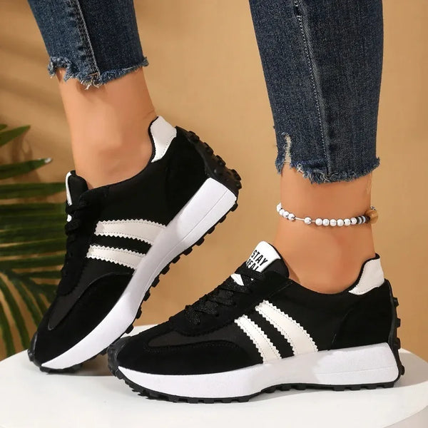Stylish women's sneakers with colorful patchwork design and rubber sole