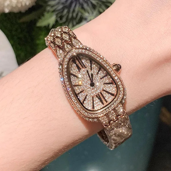 High-end ladies' watch with a shiny diamond-encrusted face and stainless steel.