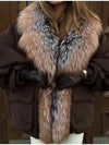 Hood up on Cozy Rebellion plush jacket for unexpected weather