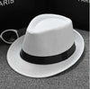 Beige fedora with a comfortable fit, perfect for any social landscape.