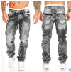 Midnight Rhythms jeans worn at a rooftop bar, capturing urban nightlife vibes.